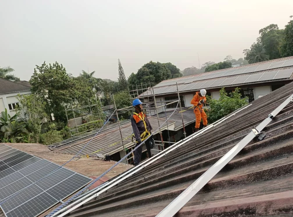 Solar installation work on a Zenira job.